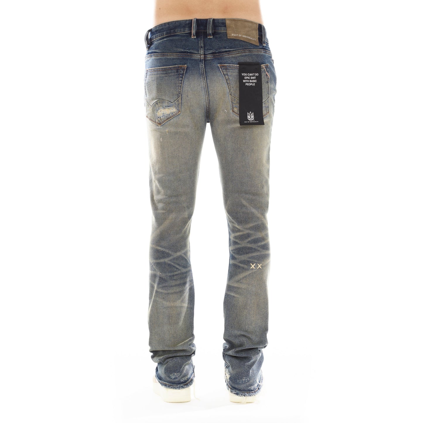 Back view of Cult of Individuality Lenny Bootcut in Cyrus jeans, showcasing the signature Cult XX on the back leg and vintage washed denim with rip detailing for added style