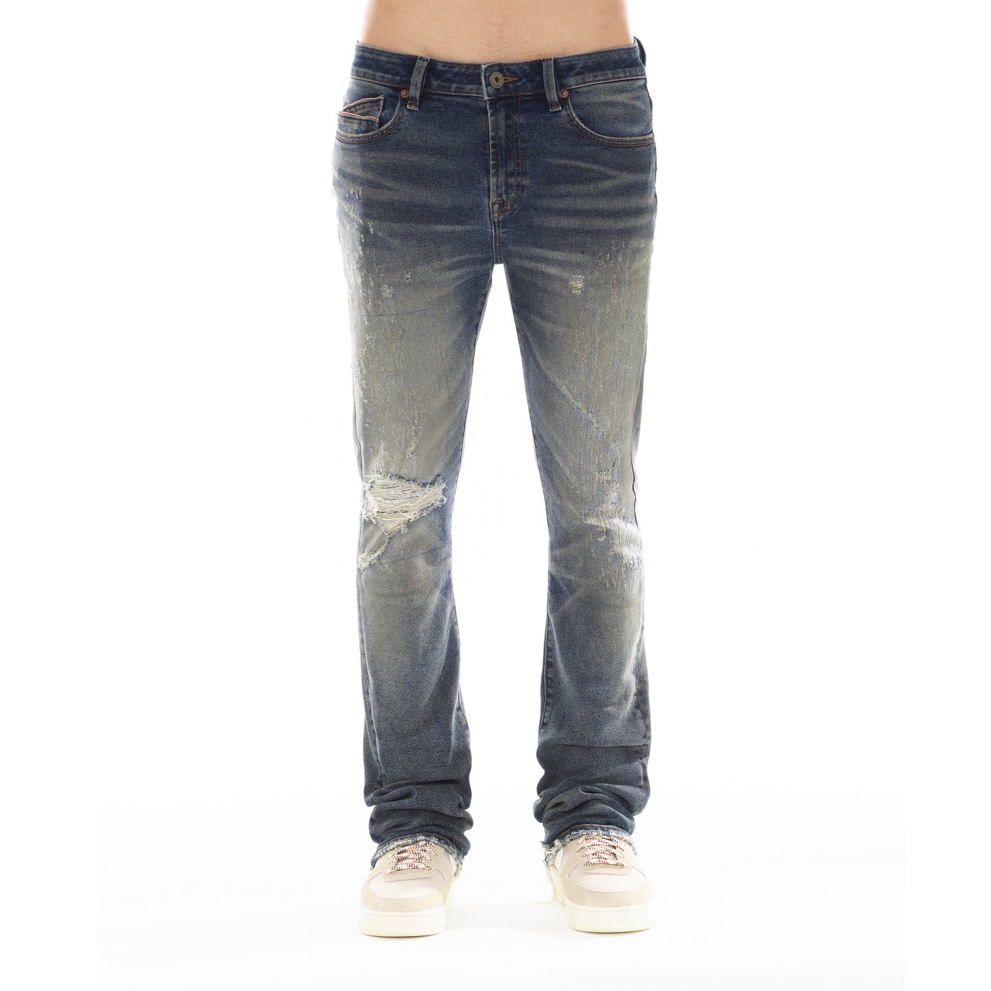 Front view of Cult of Individuality Lenny Bootcut in Cyrus jeans, featuring a wider leg from knee to ankle in vintage washed denim adorned with whiskers, rip detailing, and the signature Cult XX on the back leg