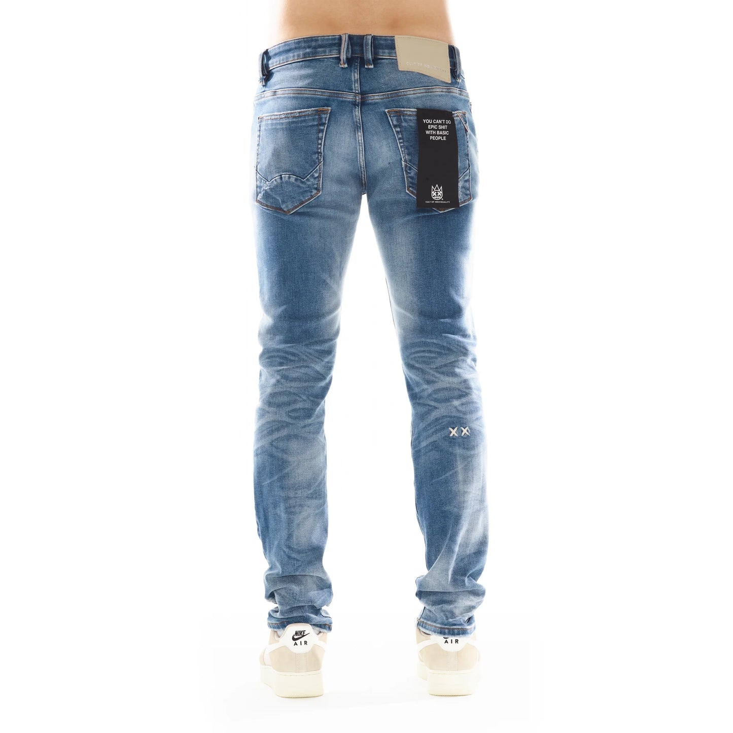 Back view of Rocker Slim in Graham jeans, featuring the Cult signature 'XX' on back pocket and acid wash design, adding urban edge to your wardrobe