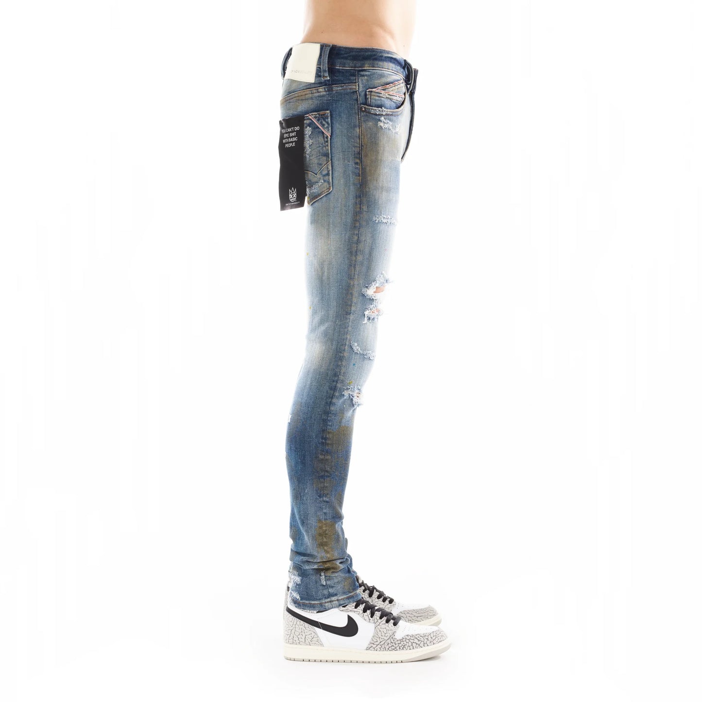 Side view of Punk Super Skinny in Lark jeans, highlighting the sleek slim silhouette and low rise design, evoking a rocker-inspired aesthetic
