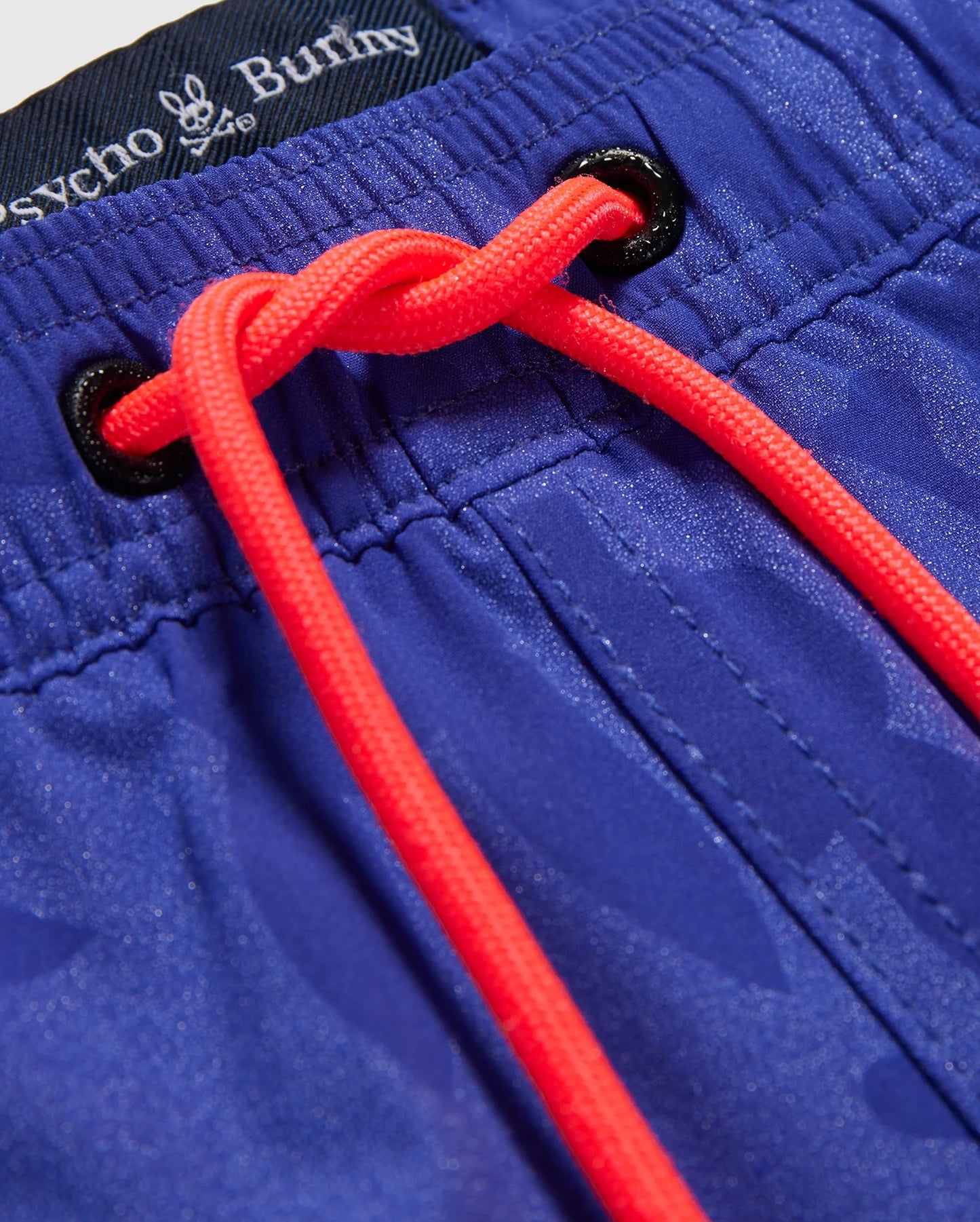 Close-up view of the knot on Men's Lancaster Hydrochromic Swim Trunk, highlighting the secure fastening mechanism for comfort and style
