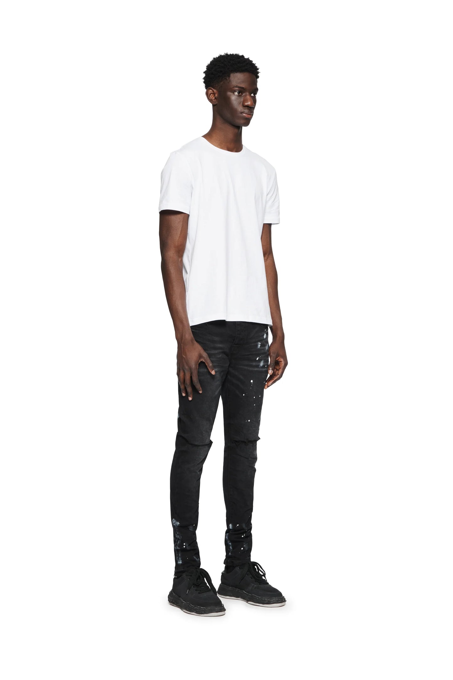 P001 Low Rise Skinny Jean Black Resin Knee Slit
