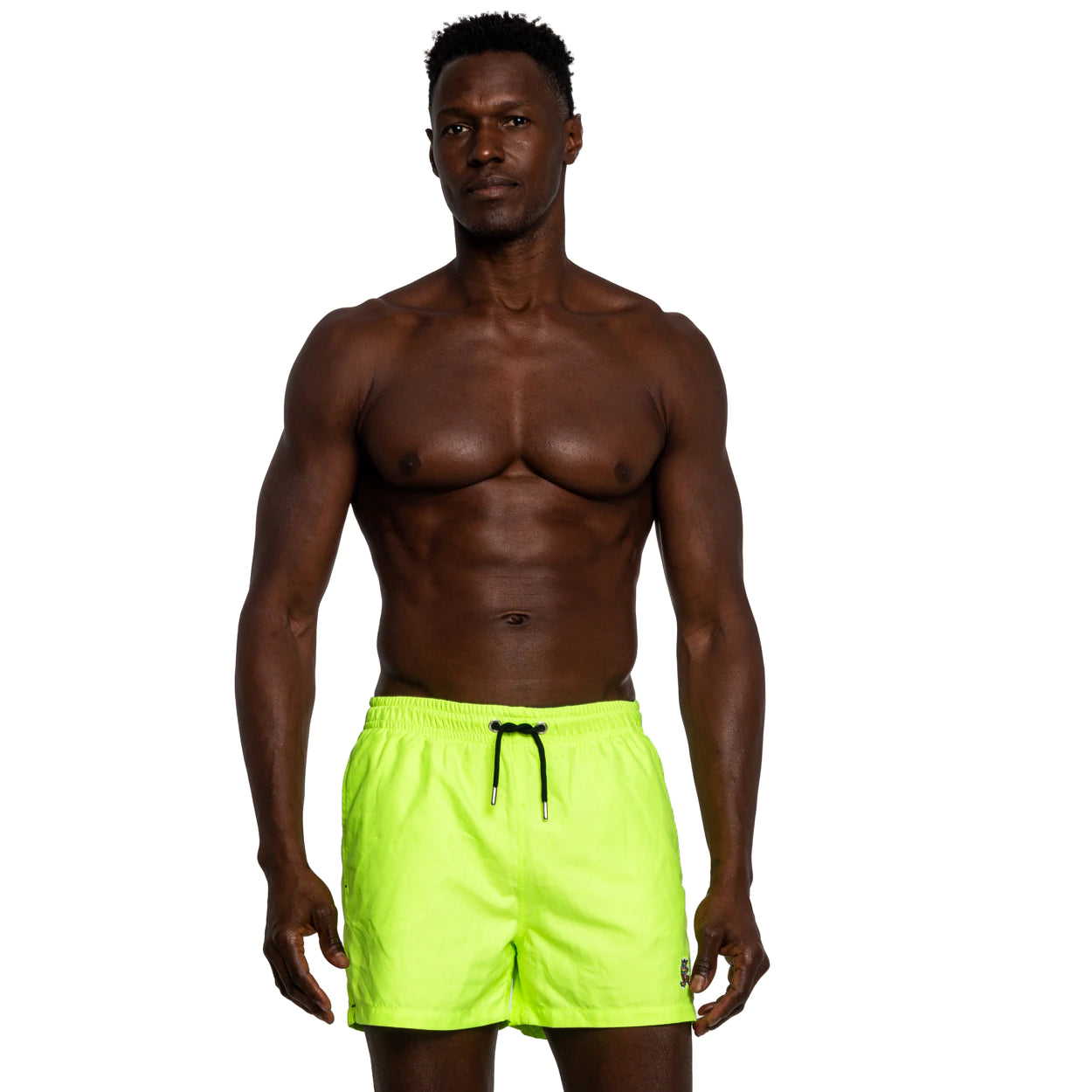 Half-shot of a person wearing FROG Swim Trunks in Neon Yellow, featuring the super comfy elastic waist with drawstrings and above-the-knee length design for a stylish and comfortable fit