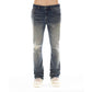 Front view of Cult of Individuality Lenny Bootcut in Cyrus jeans, featuring a wider leg from knee to ankle in vintage washed denim adorned with whiskers, rip detailing, and the signature Cult XX on the back leg