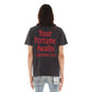 Back view of a man wearing Short Sleeve Crew Neck Tee 'Fortune' in Vintage Charcoal, highlighting the unique oversized digital prints and comfortable 100% cotton construction