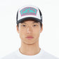 Cult's "Good At Bad Decisions" Mesh Back Trucker Hat in White