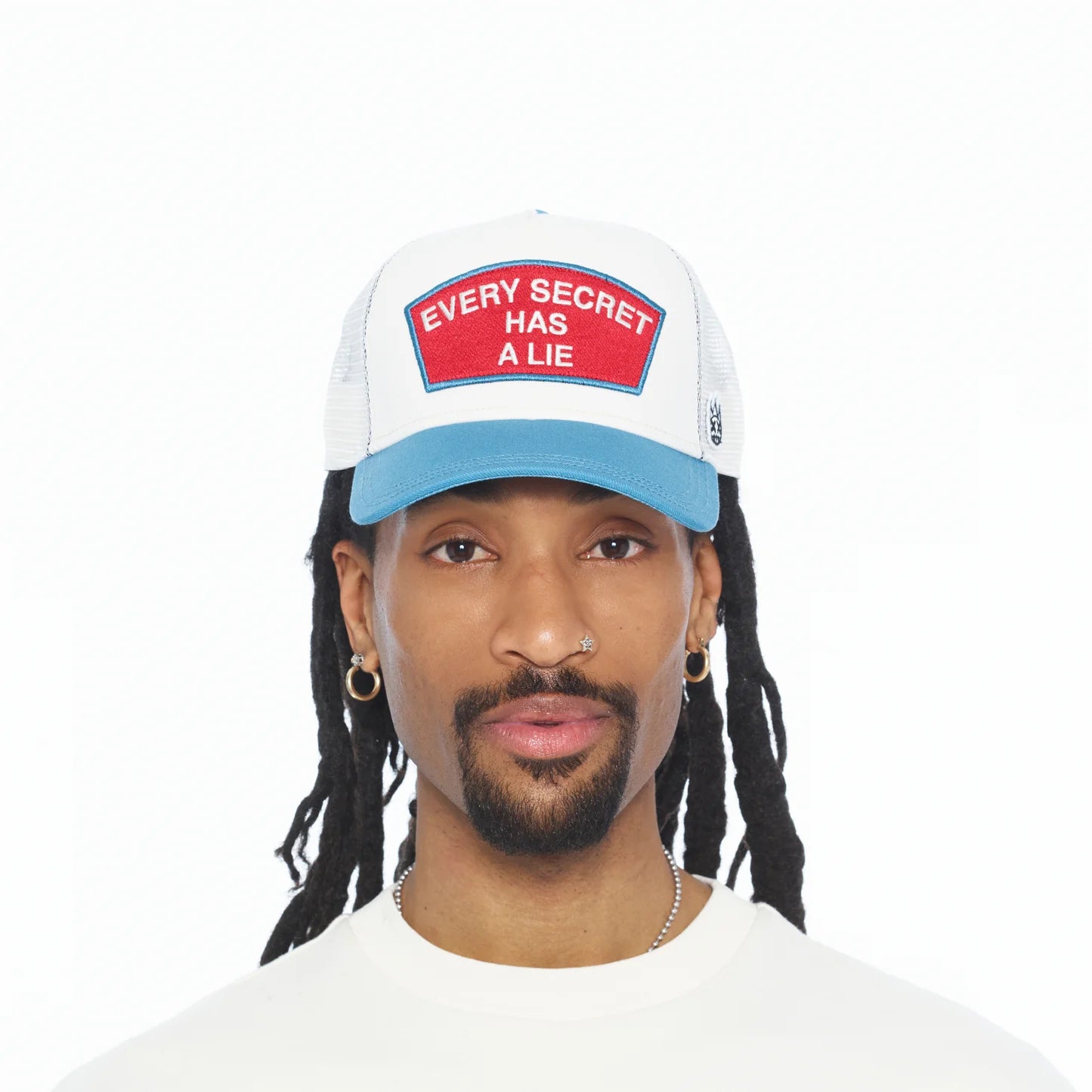 Cult's Mesh Back Trucker Hat "Every Secret Has A Lie" In Winter White 626BC-CH65A