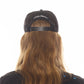 LUCKY BASTARD LOGO TRUCKER HAT IN BLACK