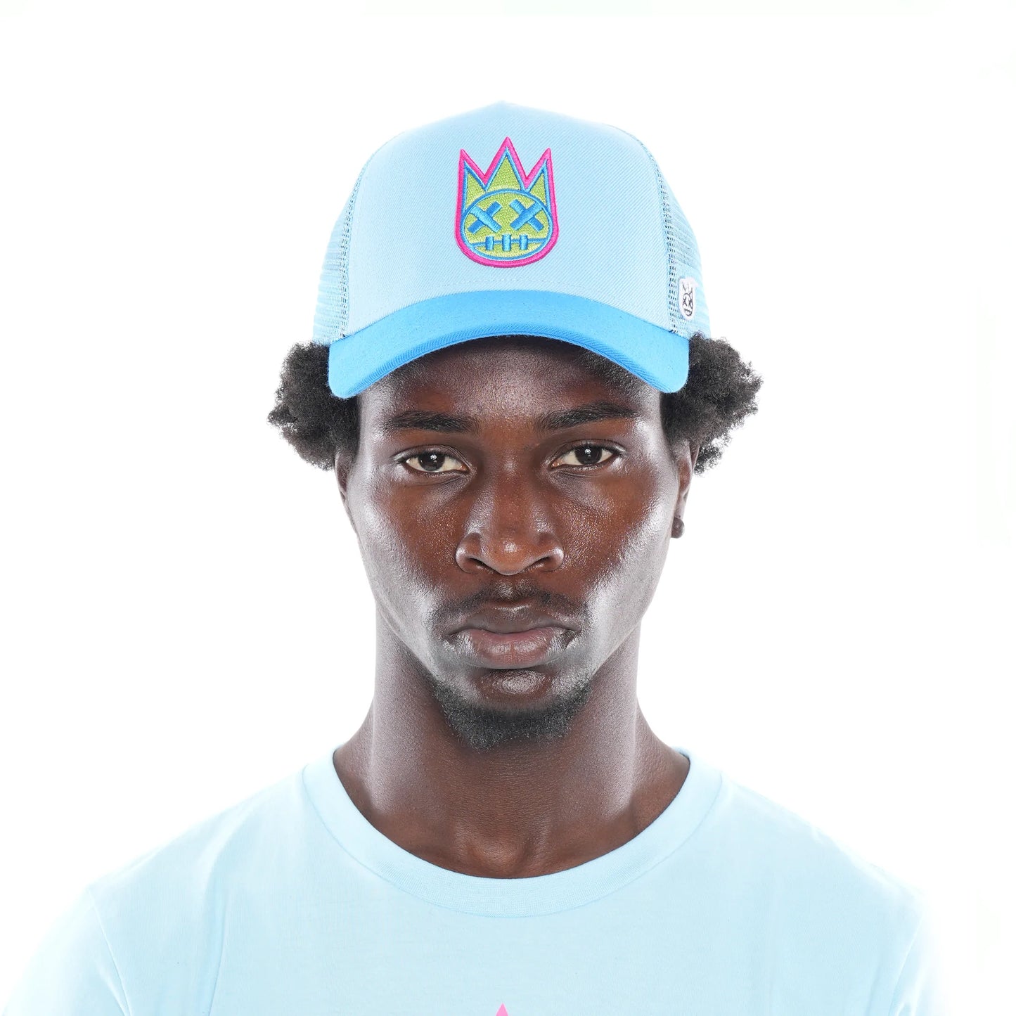 CLEAN LOGO MESH BACK TRUCKER CURVED VISOR IN ATOMIZER