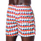 Backside view of Sunset Alchemy Swim Trunks, featuring convenient pockets and a comfortable fit, perfect for beach activities or lounging by the pool